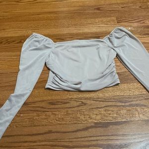 Dusty pink top with shear sleeves by the brand Stella Luce size M